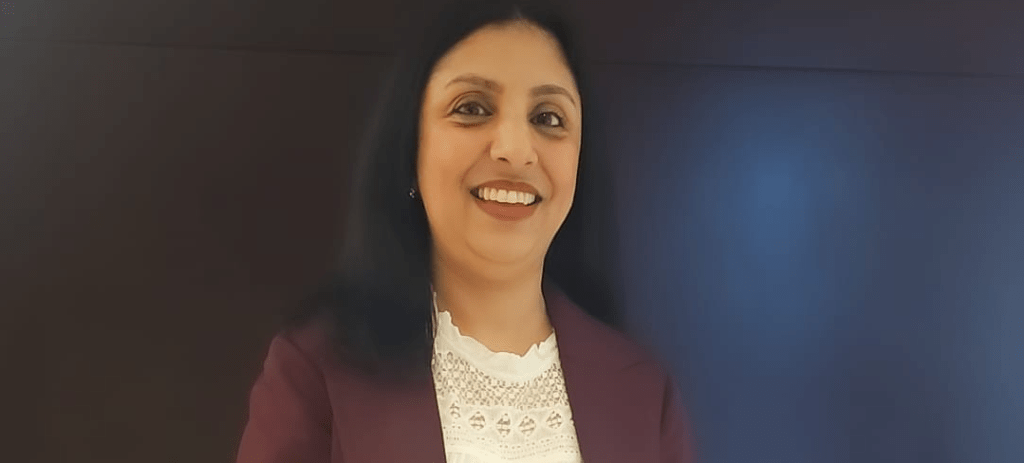 Lady with dark hair smiling