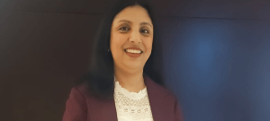 Lady with dark hair smiling